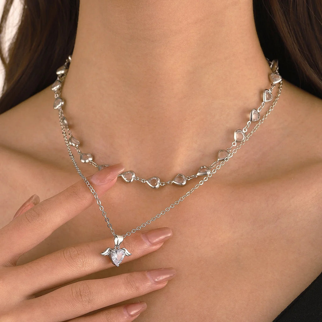 Crystal Heart Layered Necklace detail — crystal heart pendant close-up, House of Ugarit
