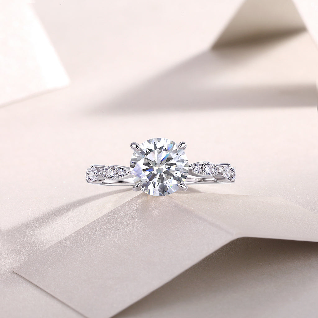Stella Moissanite Platinum Ring — moissanite fire under light, House of Ugarit