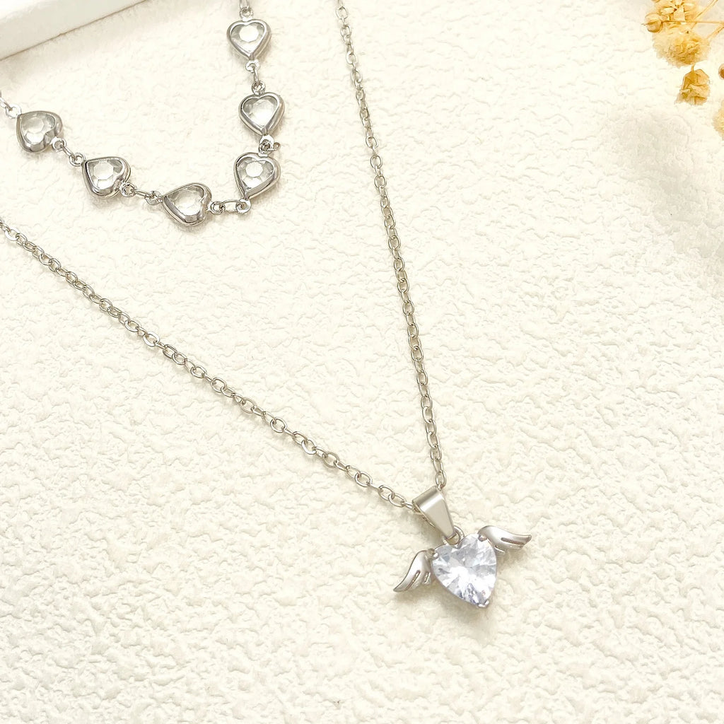 Crystal Heart Layered Necklace worn — layered crystal heart pendant necklace, House of Ugarit